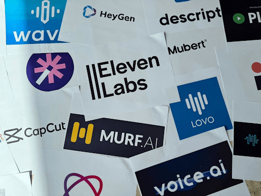 Collection of various company and product logos on a wall or surface.